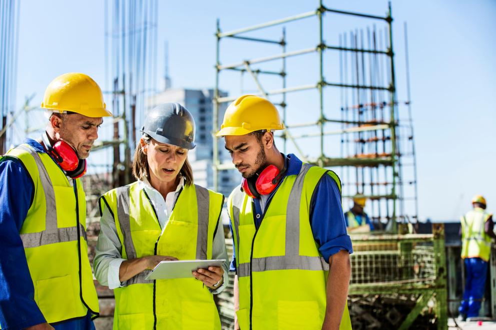 Photo of construction workers on a building site